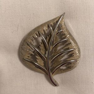 Silver costume leaf brooch
